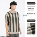 Man wearing a striped short sleeve viscose sweater with zipper details in sapphire blue.
