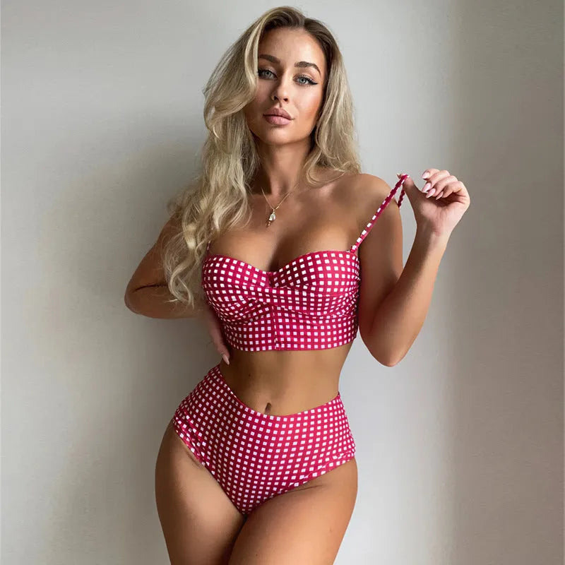 Women's rose red high-waist plaid bikini swimsuit with split sides on mannequin.