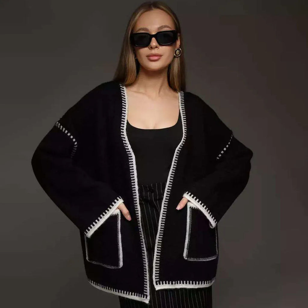 Loose fit lace-up front knitted cardigan in black, camel, or white colours.