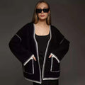 Loose fit lace-up front knitted cardigan in black, camel, or white colours.