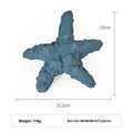 Blue and green shark-shaped rubber dog chew toy on a white background.
