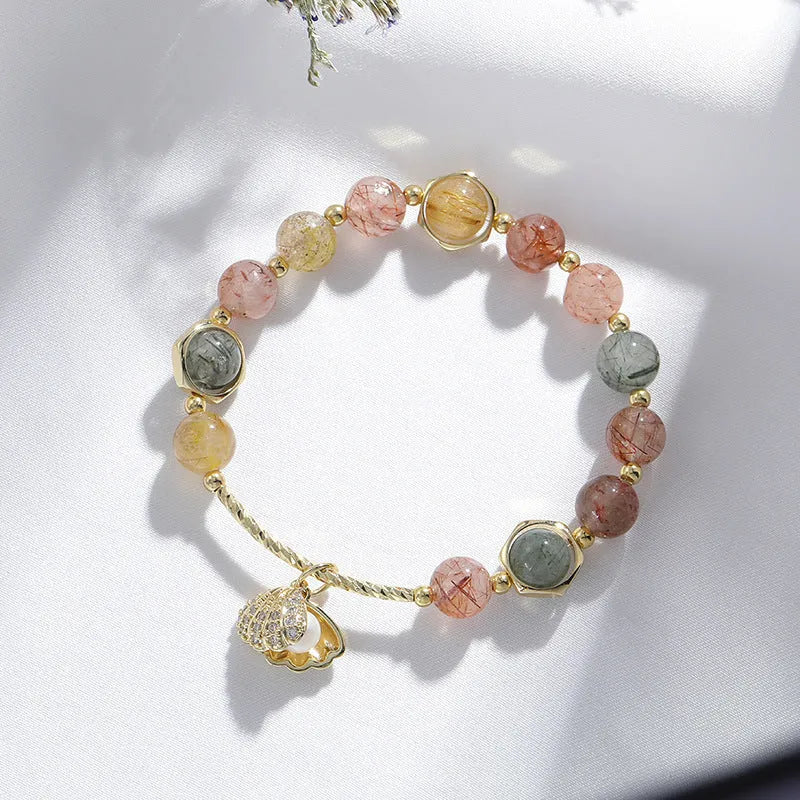 Colourful crystal bracelet with hair crystal shell and red sealant flower shell designs