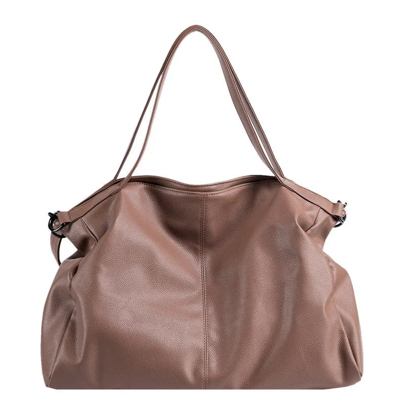 Large khaki soft PU messenger bag with long strap, shown open with internal phone and zipper pockets.