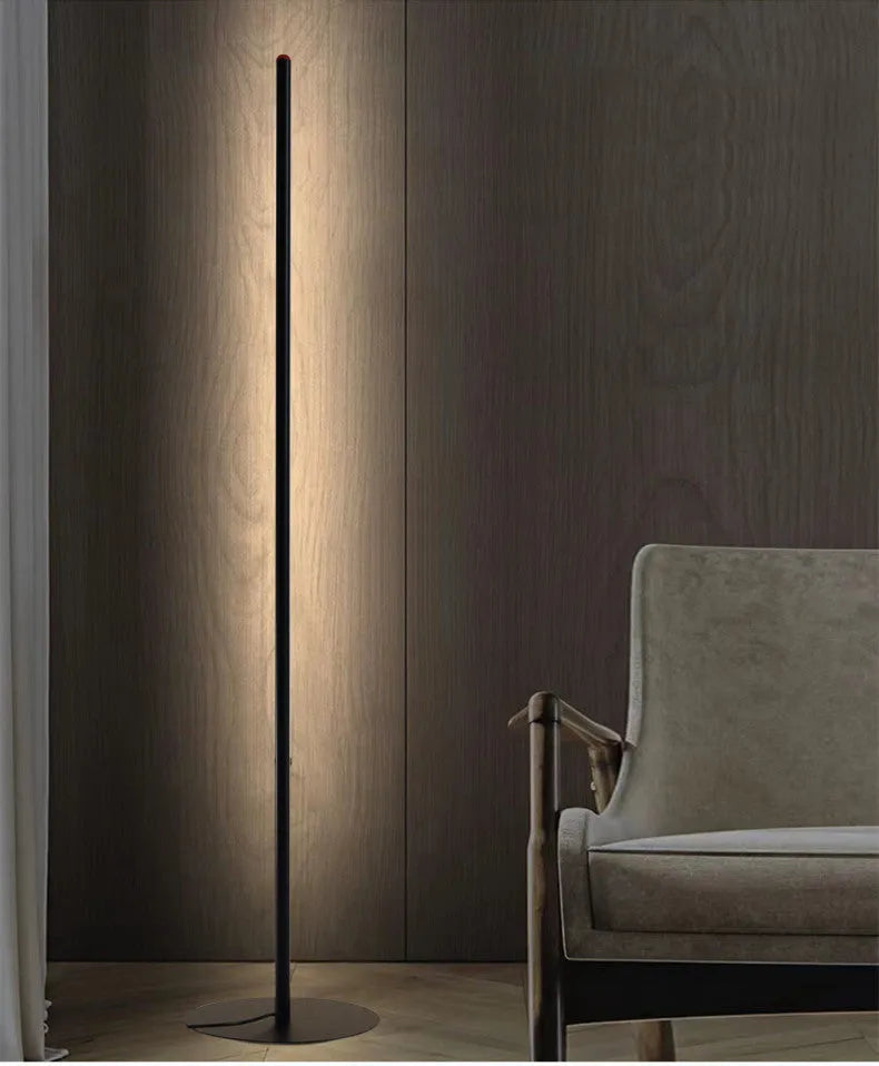 Tall, slim aluminium alloy vertical floor lamp with a simple design and LED light.