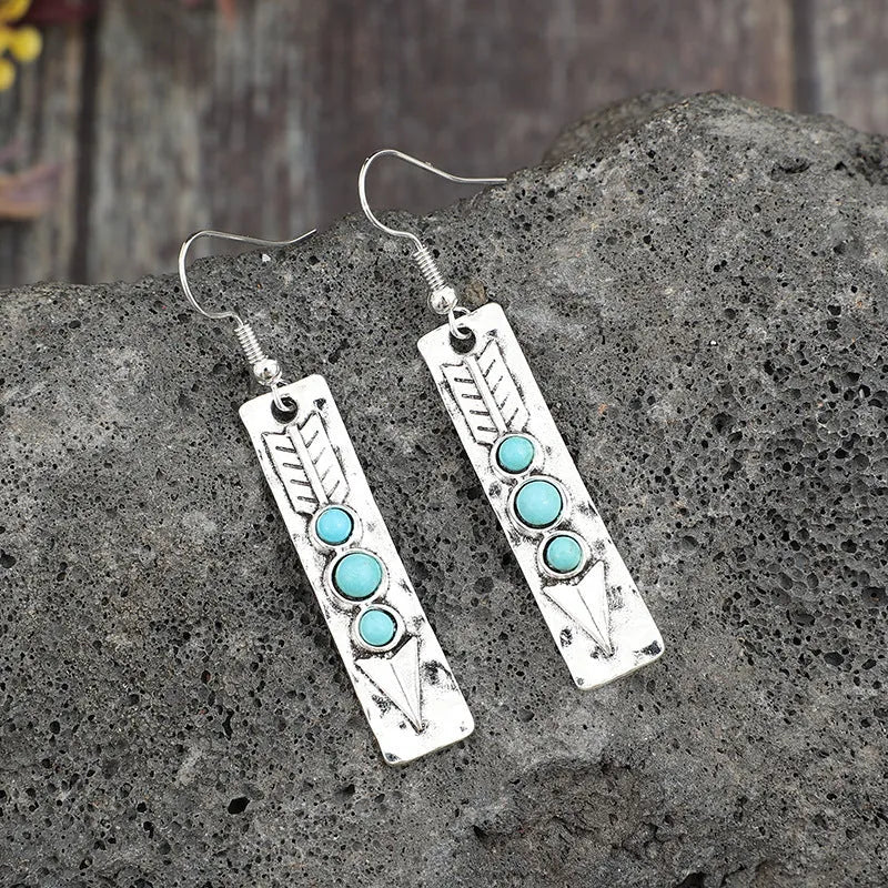 Silver geometric retro earrings with turquoise inlay on long strip zinc alloy design