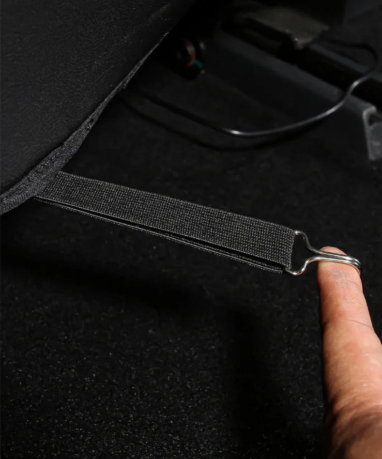 Two black leather rear seat anti kick pads showing full coverage design and single pocket style.