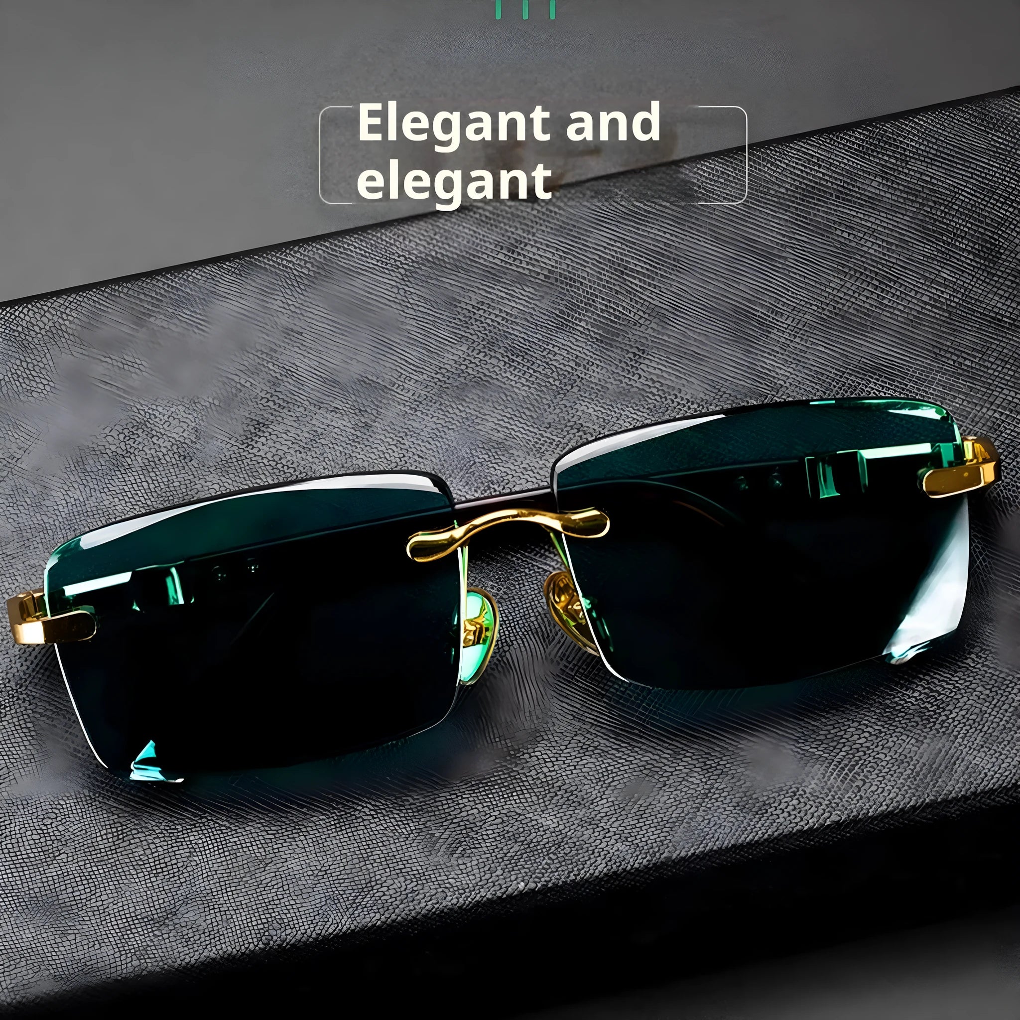 Dark green frameless crystal sunglasses with a hard case and cleaning cloth on a plain background.
