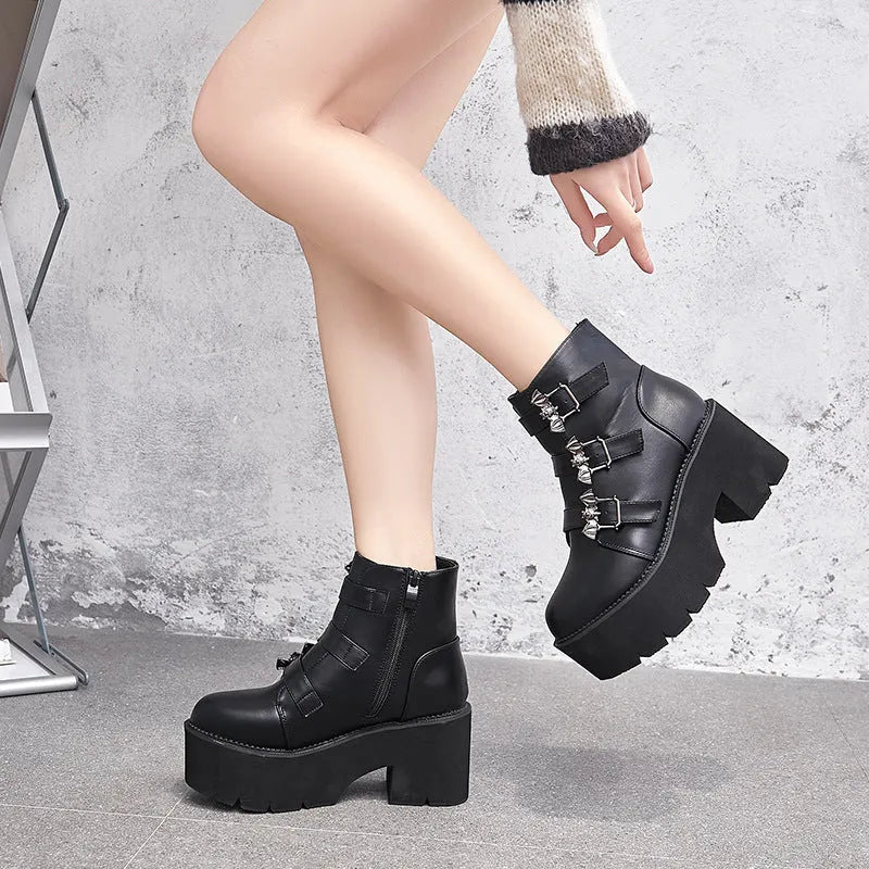 Black women's punk gothic short boots with bat buckle and side zipper on thick heel.