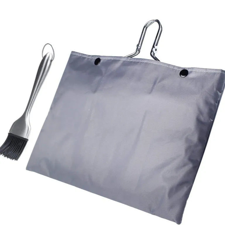 Square folding stainless steel wire mesh basket for barbecues with a cleaning brush.