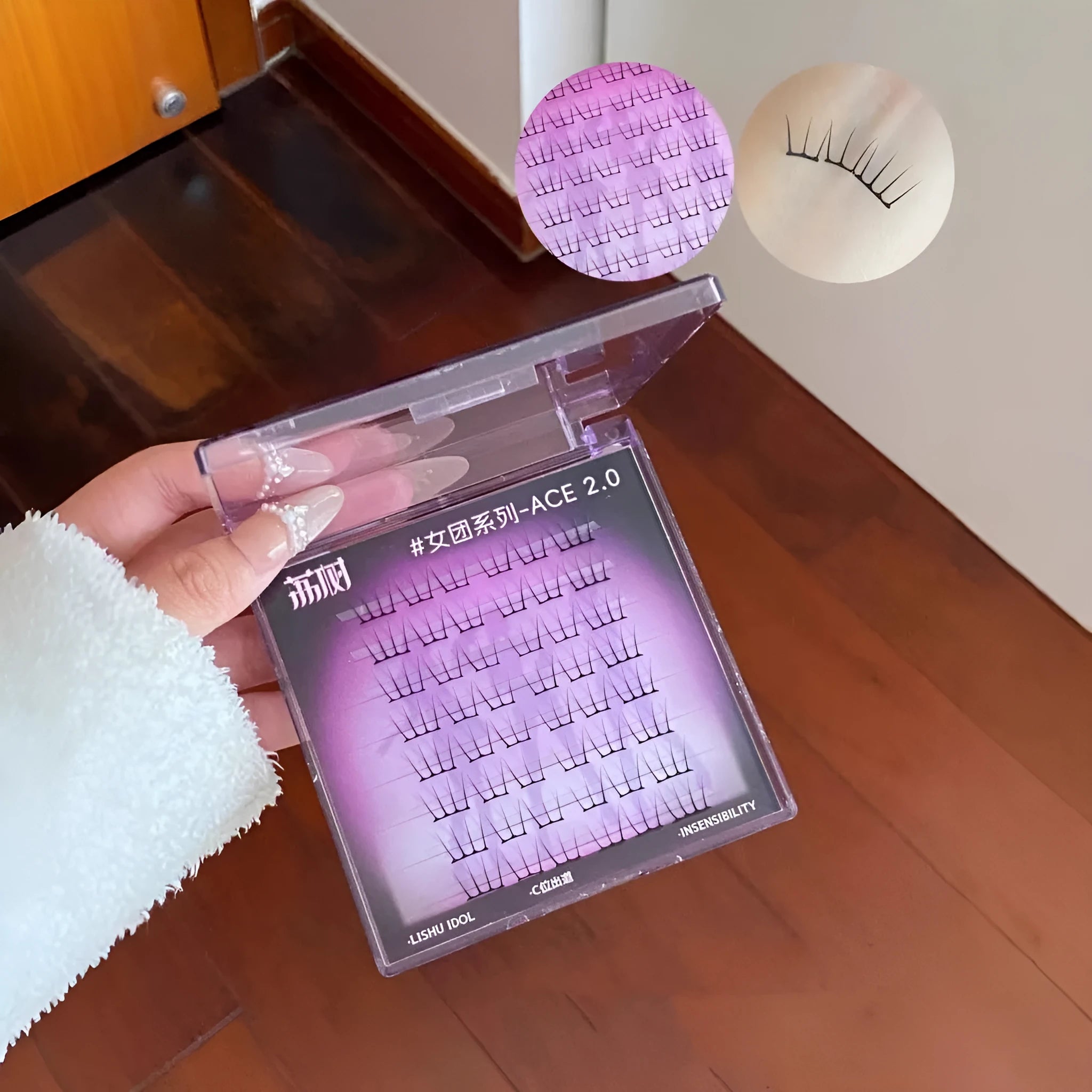 Reusable artificial fibre false eyelash clusters in cluster packaging with optional tweezers