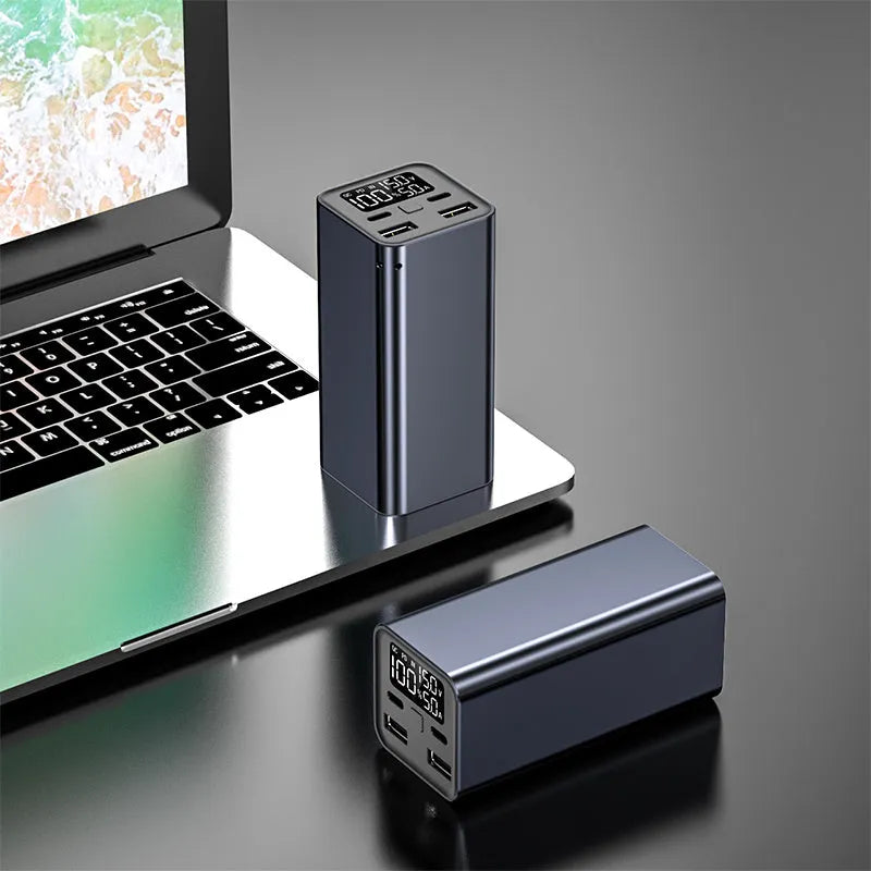 Black high-power 65W metal charging bank with 20000mAh capacity for laptop fast charging.