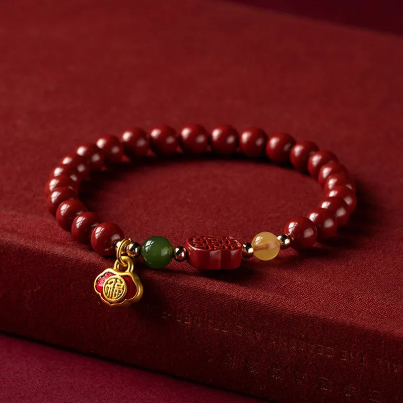 Emperor sandstone Fu character bracelet with happy eyebrow pattern in 6mm or 8mm cinnabar bead sizes