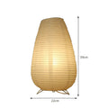 White rice paper plug-in table lamp with traditional shade on wooden surface