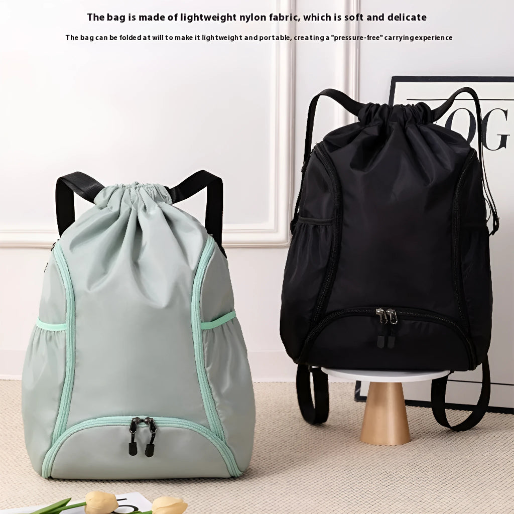 Cube-shaped sports backpack with drawstring closure in colour options including black, grey, green