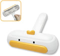 Yellow duck design portable pet hair remover tool with plastic body and bristles.
