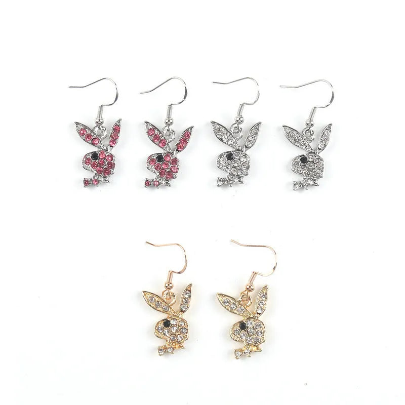 Cute cartoon rabbit stud earrings for women in gold, pink, and silver alloy.