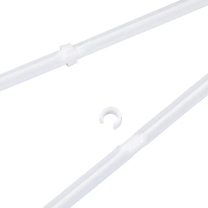 Ten white plastic car window flag pole clip mounts laid out on a surface.