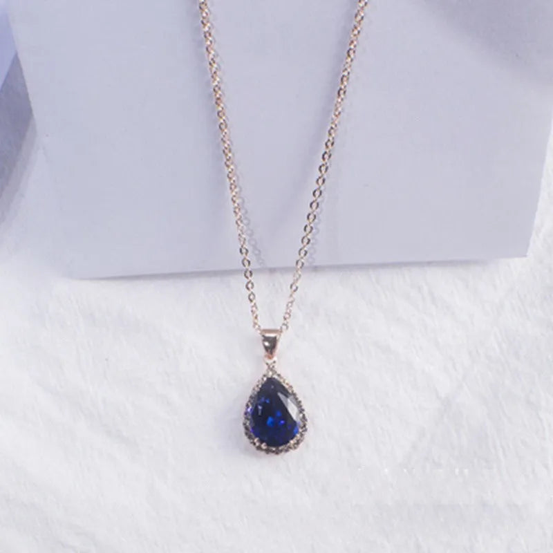 Rose gold geometric water drop pendant necklace with rhinestone inlay