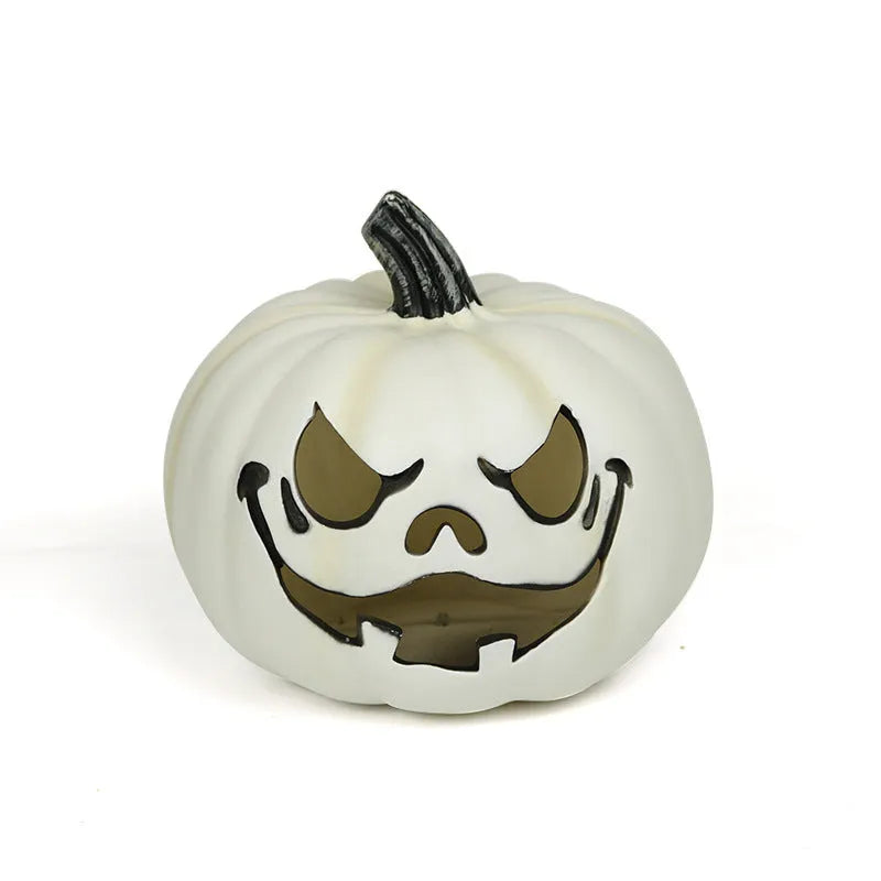 Orange plastic pumpkin-shaped atmosphere light on a dark surface, 23 cm size