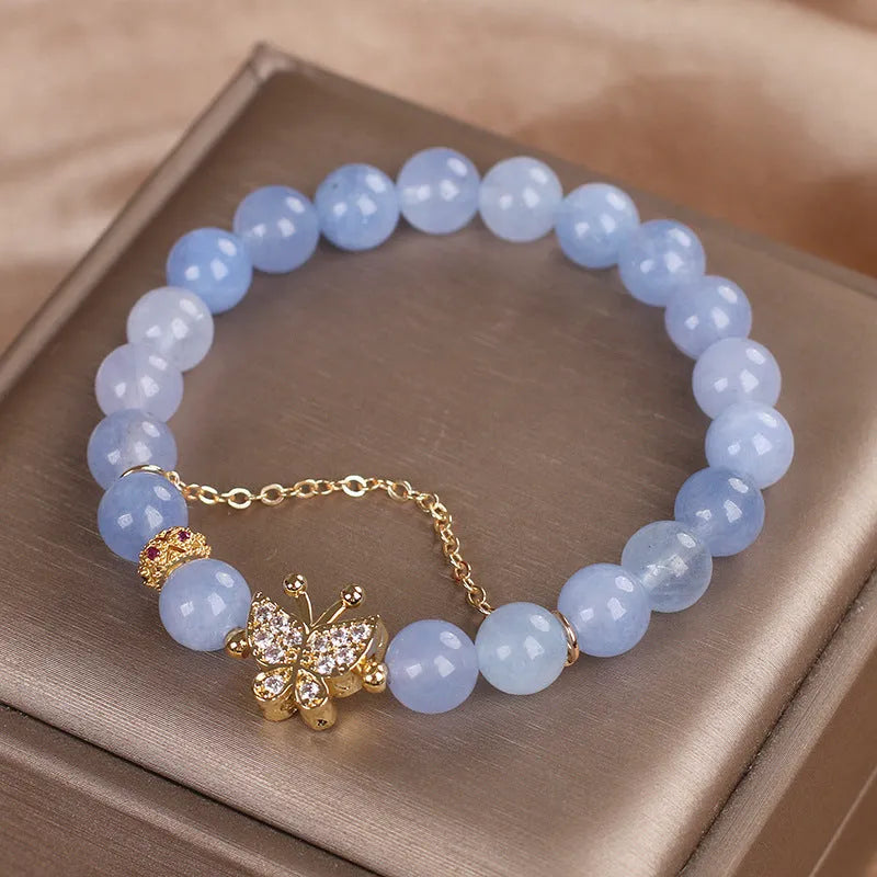 Sky blue aquamarine butterfly crystal bracelet with pearls and rhinestones measuring 17cm length