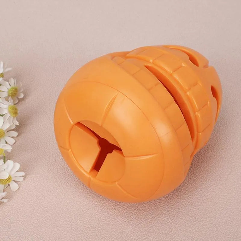 Yellow TPR pumpkin-shaped durable dog chew toy for aggressive chewers