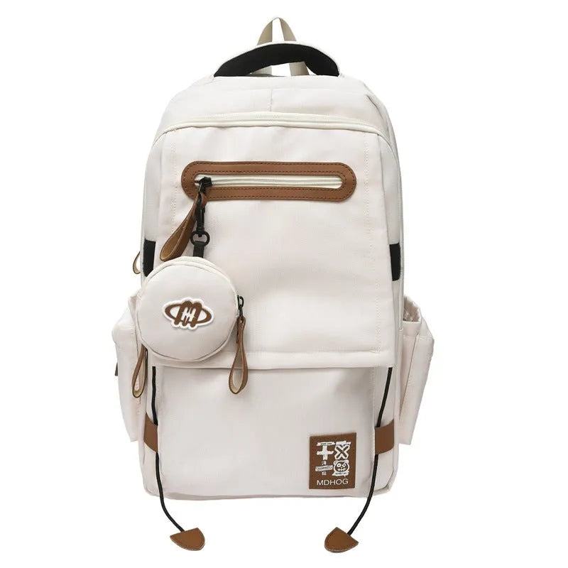 Japanese leisure travel backpack in black with contrast stitching and 20-35 litre capacity