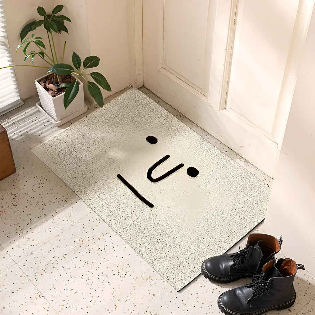 Square PVC home floor mat with a geometric pattern and cartoon Mr. Big Nose facial expression.