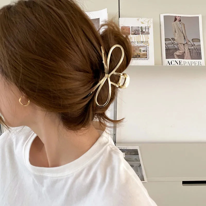 Korean style bow barrette hair clip in gold or silver alloy for women's hairstyles