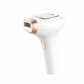 Pink and white three-in-one ice-sensing laser hair removal device with included shaver and safety glasses