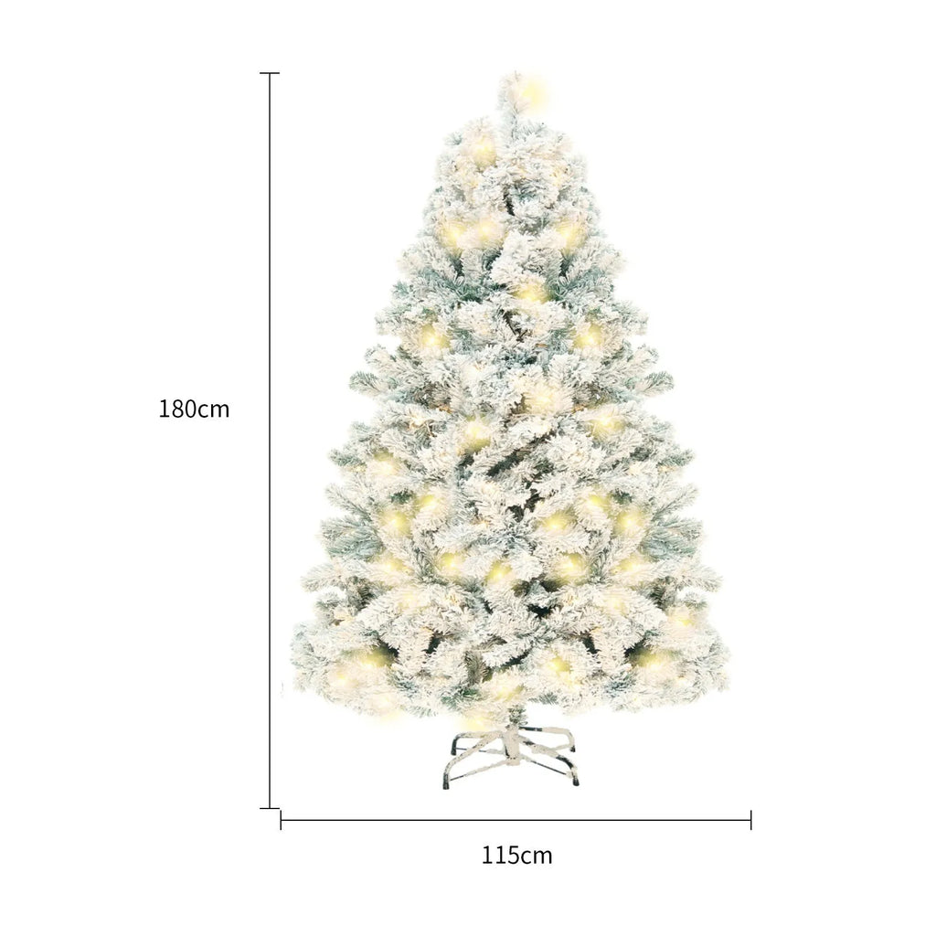 Artificial green and white snow-effect PVC Christmas tree with metal stand.