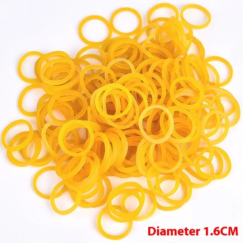 Yellow rubber bands in mixed sizes from 25mm to 70mm diameter in a 500g bulk pack