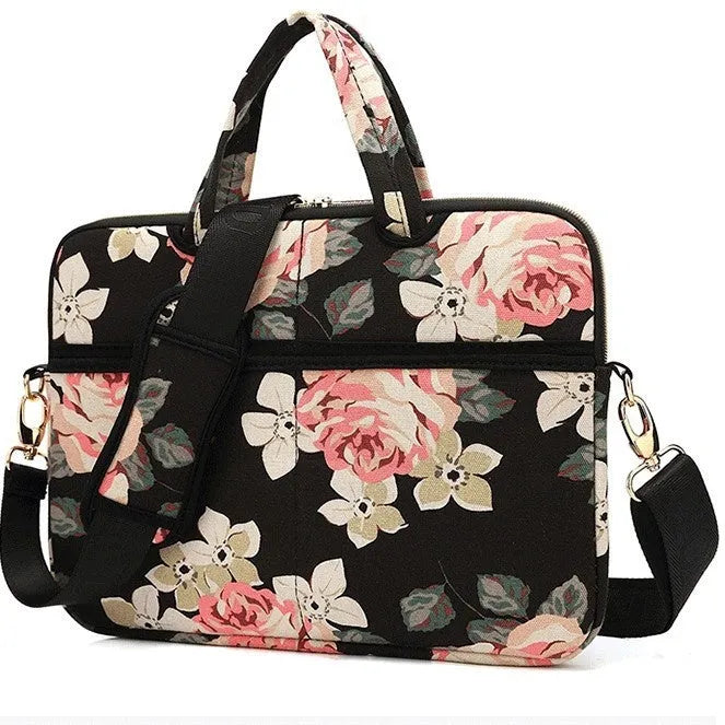 Canvas laptop sleeve with printed pattern for 13-15 inch notebooks, plush lining, and padded shoulder strap