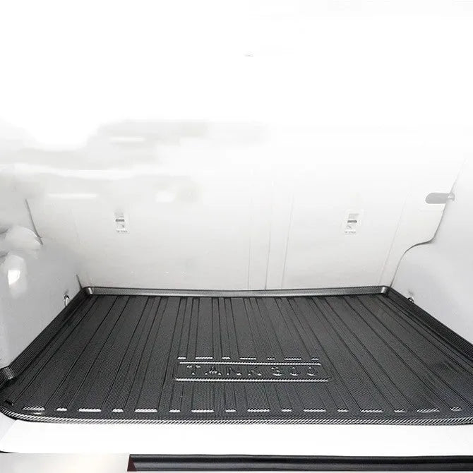 Black carbon fibre pattern TPE tailgate boot liner for a special model car.