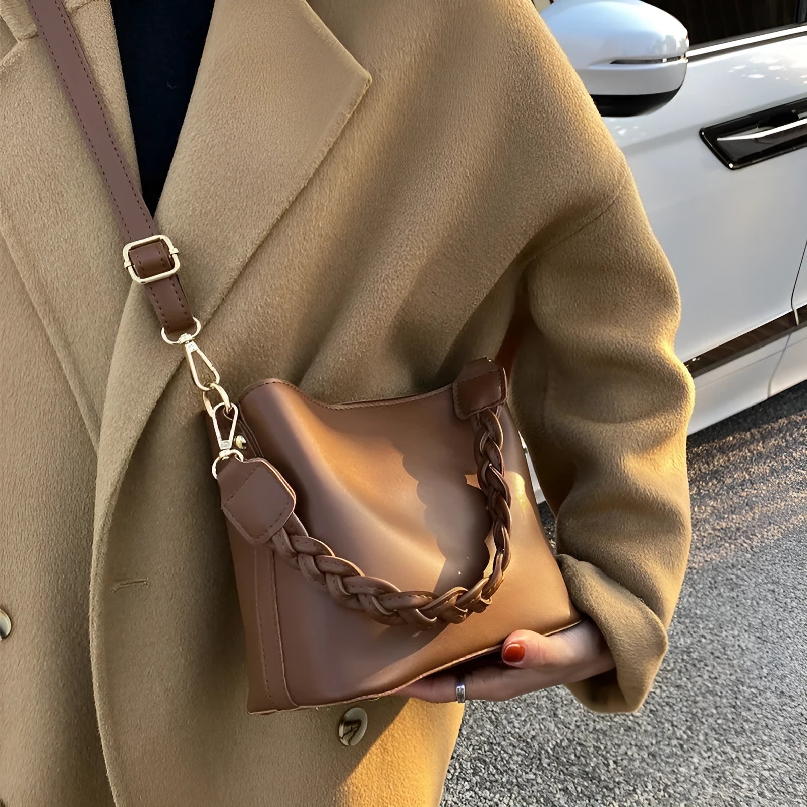 Retro style woven PU one-shoulder crossbody bucket bag in khaki colour.