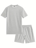 Man wearing a light waffle-texture short sleeve blouse and matching shorts in apricot colour.