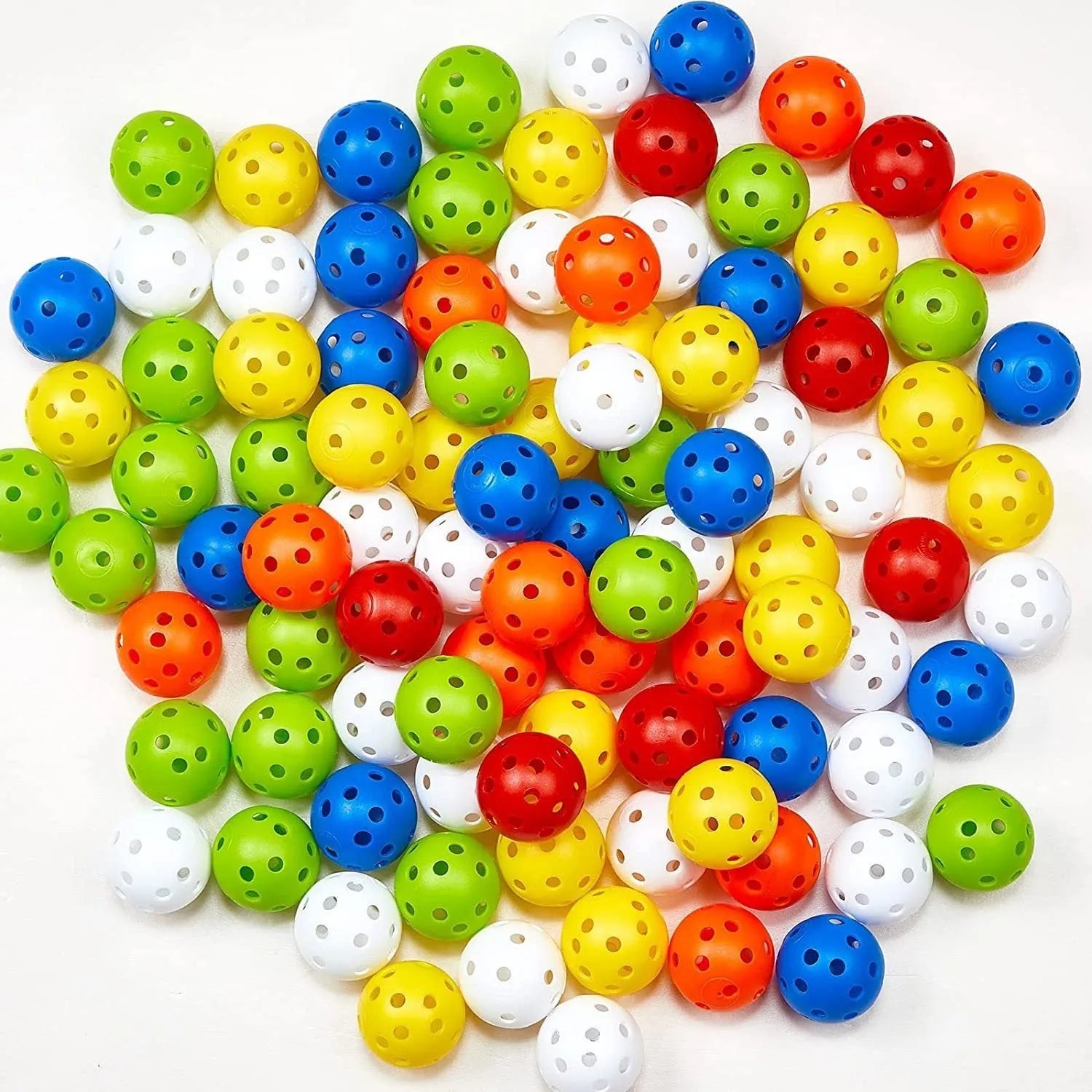 Multi-colour 42mm polyethylene golf practice balls in a net bag.