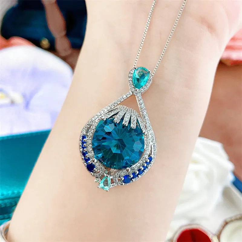 Blue crystal geometric pendant necklace with water wave chain for women