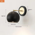 Nordic style iron wall lamp mounted on a wall, showcasing its solid construction and shade design.