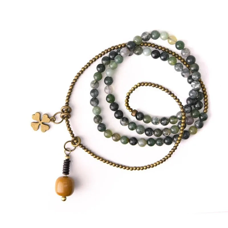 Handcrafted ethnic children's bracelet with natural crystal stones in multi-layered retro design