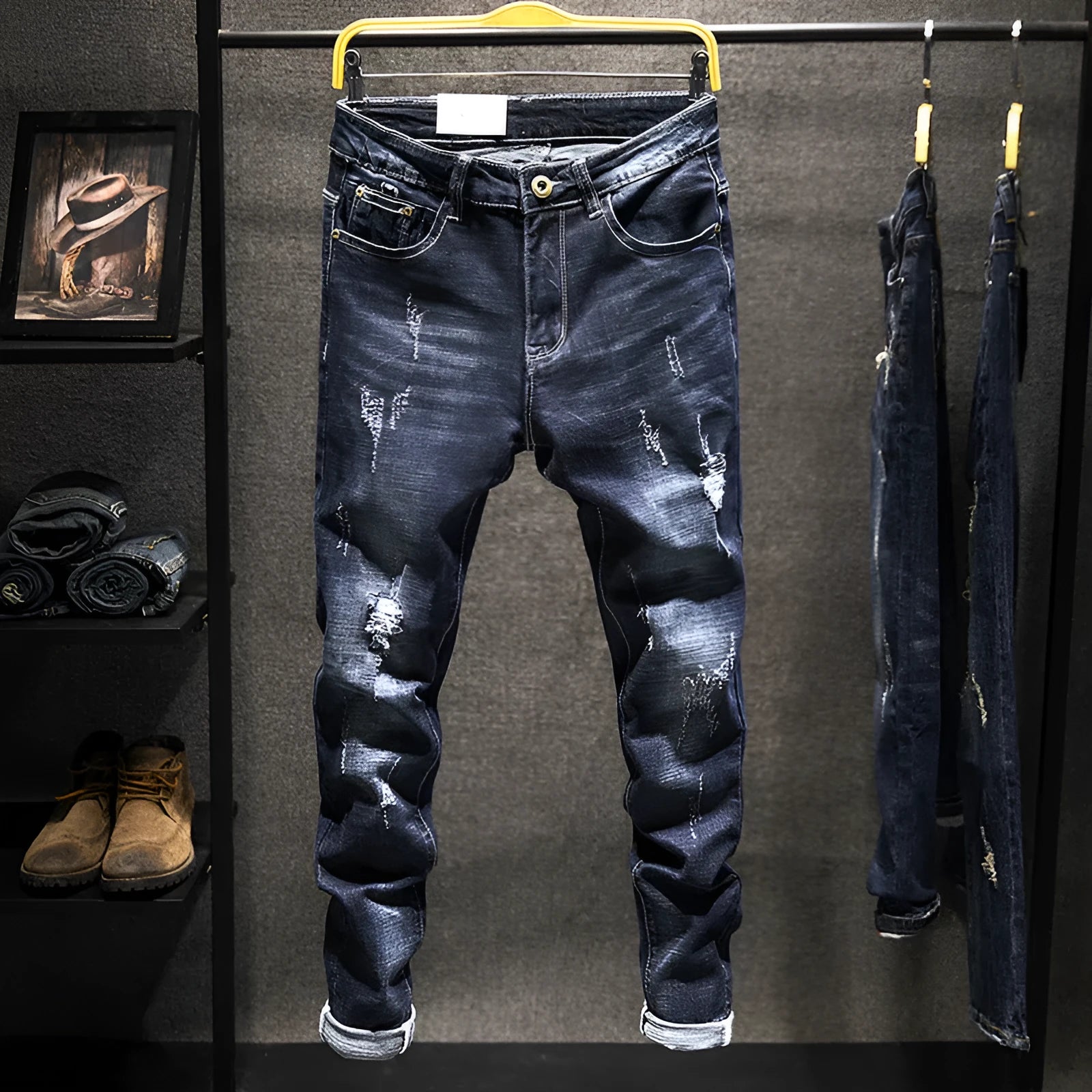 Men's slim-fitting skinny jeans in dark blue cotton denim with micro elasticity, showing mid-waist trousers design