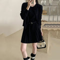 Women's black art retro knitted two-piece set with long-sleeve cardigan, pleated vest skirt, and a belt.