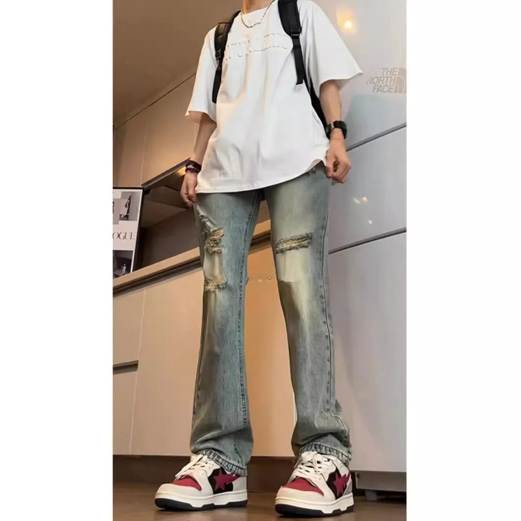 American V retro tattered jeans in blue cotton denim loose fit straight leg for women