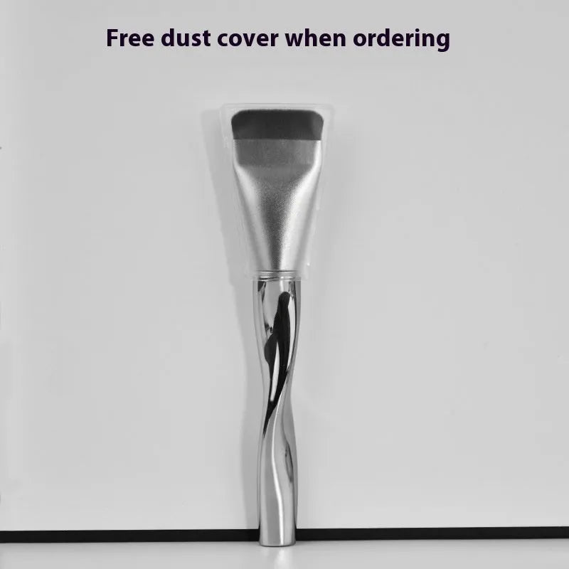 Spiral one-shaped powder foundation brush with long plastic handle on a black pineapple box