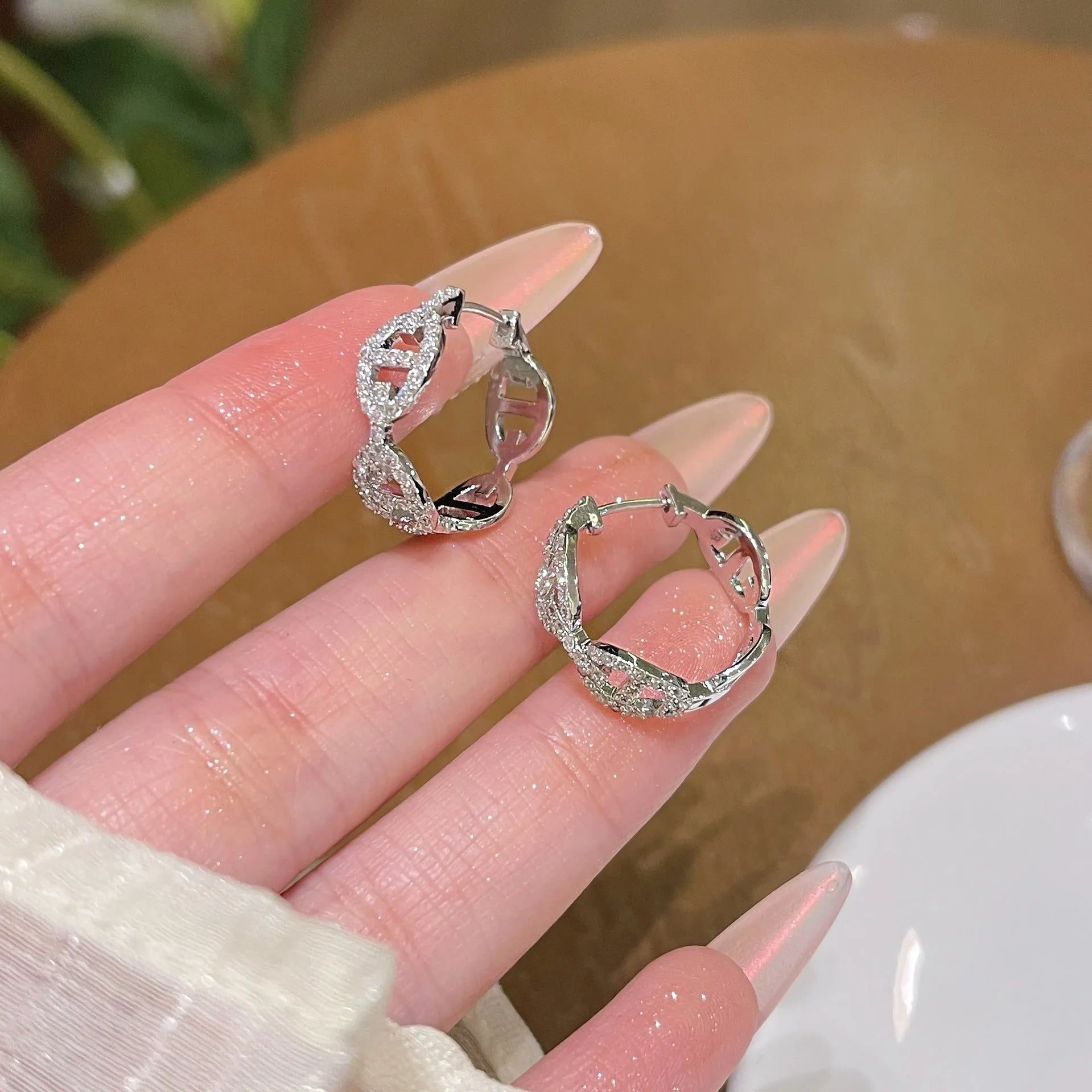 Ladies diamond light luxury earrings in copper with silver, gold, and rose gold electroplated finishes