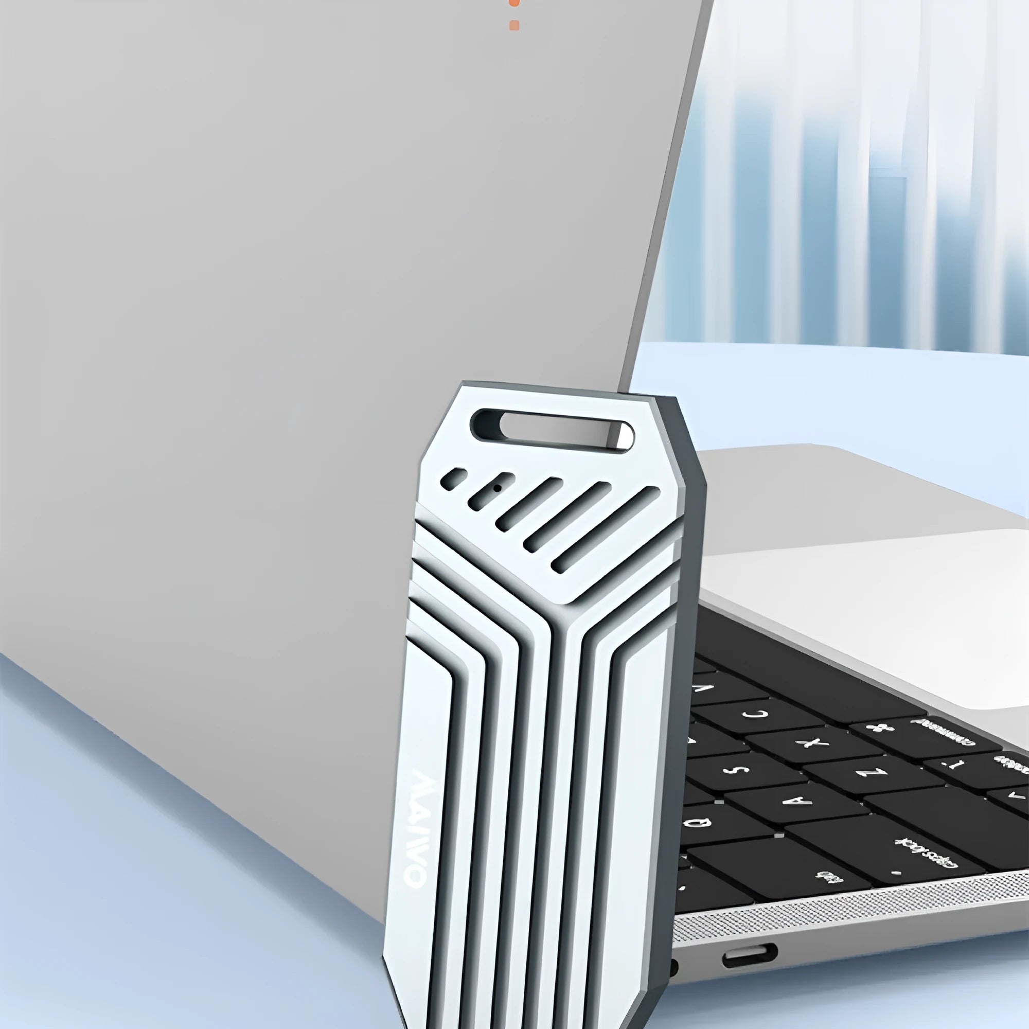 Aluminum Thunderbolt 4 NVMe SSD enclosure in silver or grey with optional cooling fan for Mac M2 and PC