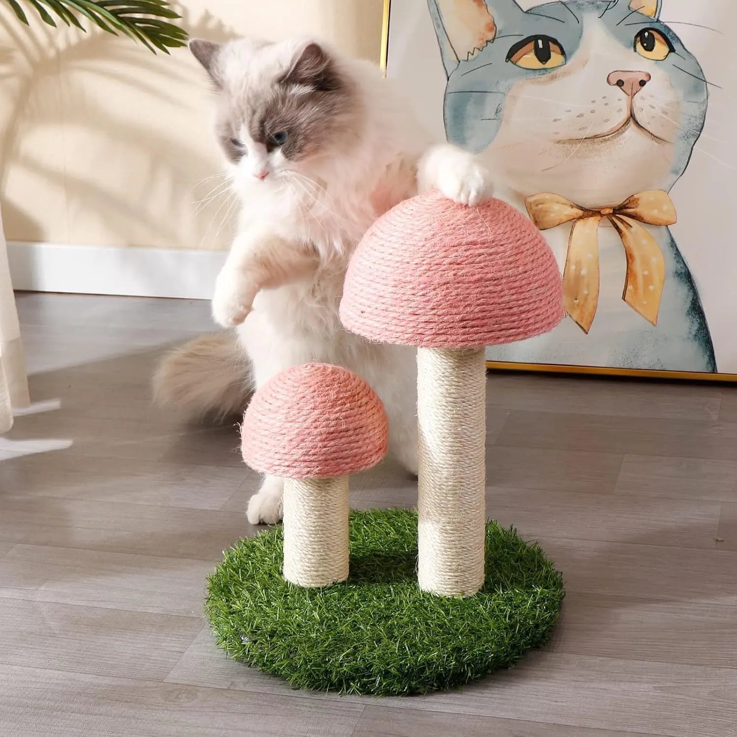 Pink mushroom-shaped cat scratching post with natural sisal cap and pole for small cats