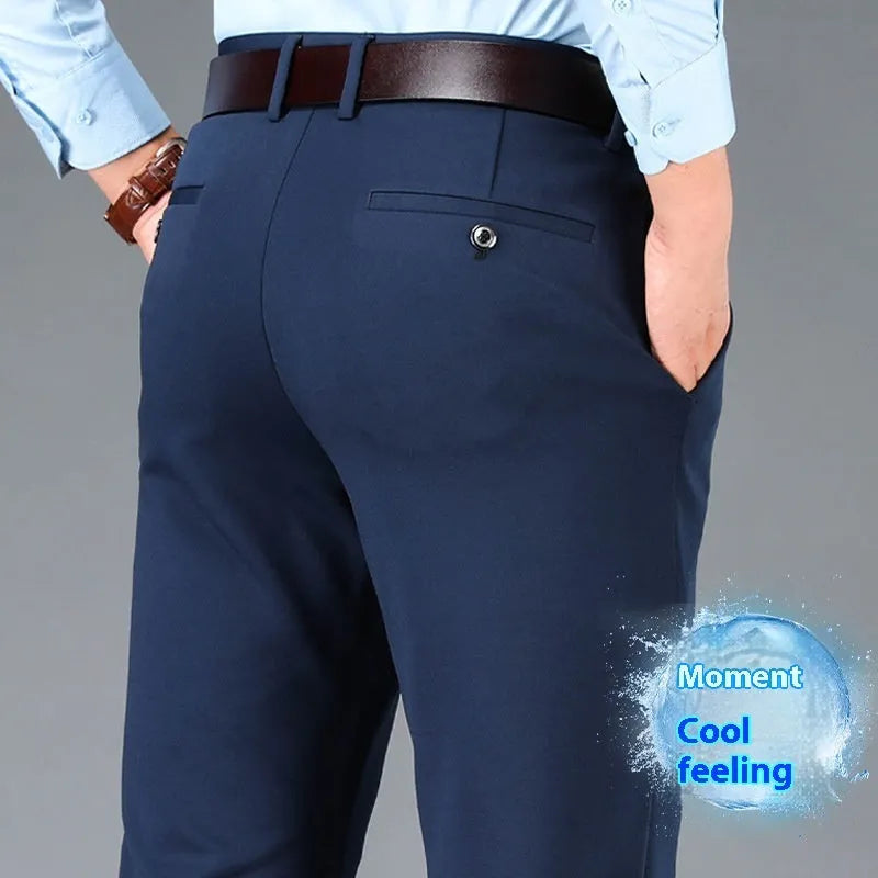 Men's straight-leg trousers in a dark colour on a hanger, showing mid-waist and zip fly design.