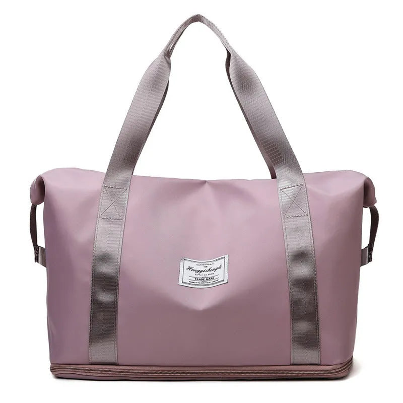 Large capacity Oxford cloth shoulder bag in lake green with multiple zippered pockets for travel