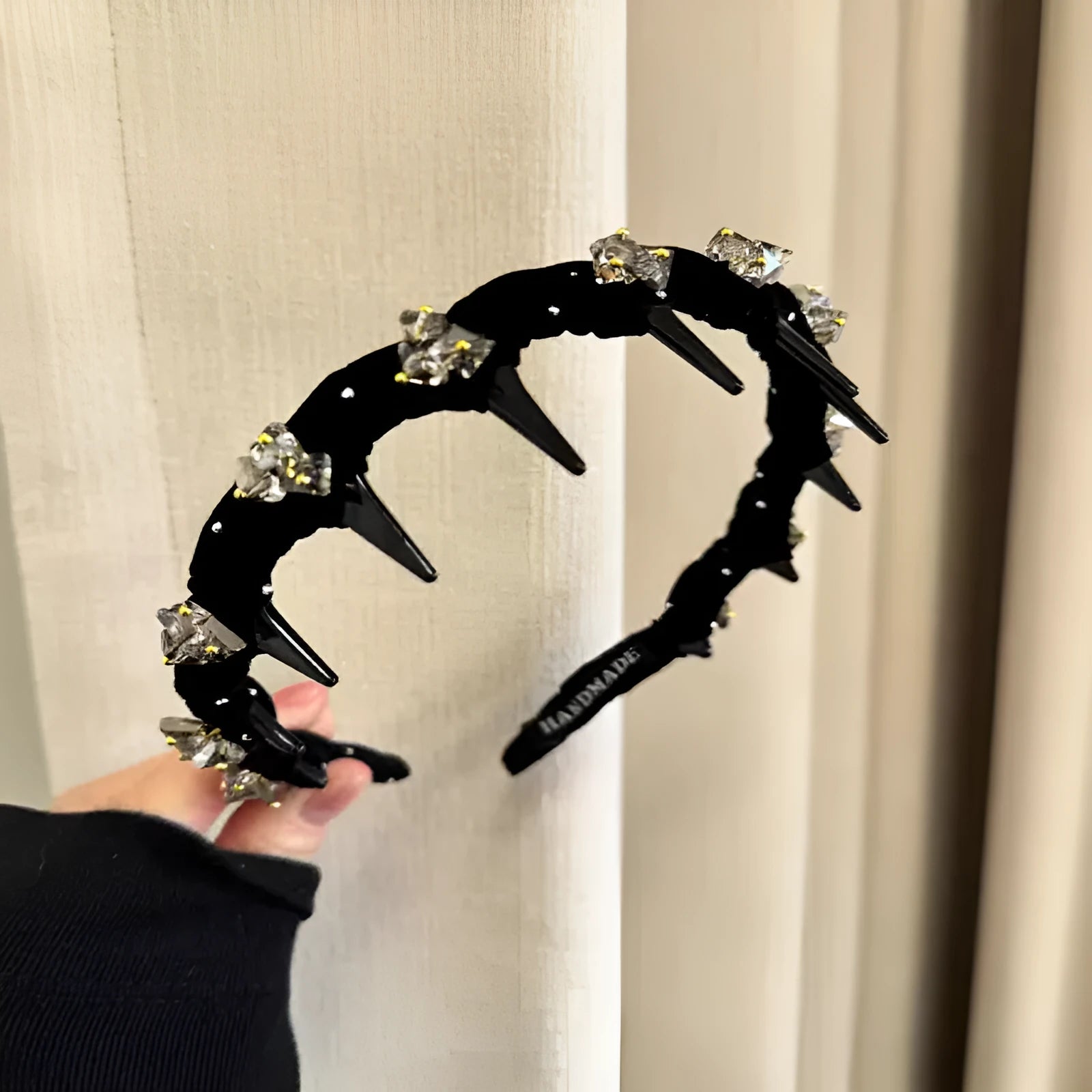 Velvet hairband with crystal wave decoration in non-slip design for face care routines