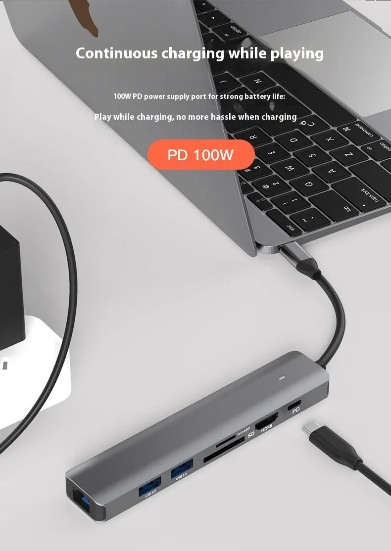7-in-1 USB-C multi-port hub with SD card slot, microSD slot, three USB ports, and PD charging port.